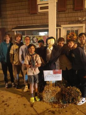 Picture of Troop 158 (Hackettstown) around a scarecrow.